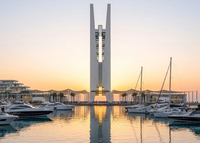 Luxury marina and modern architectural tower at sunset in alam elroum north coast egypt